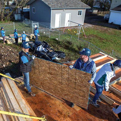 Cowan employees participate in a Habitat for humanity build